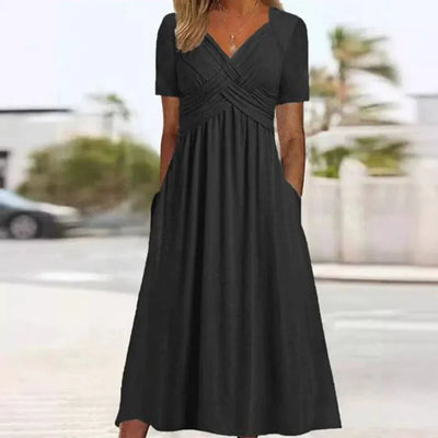 Frances - Elegant og Sofistikeret Kjole med Flatterende Design