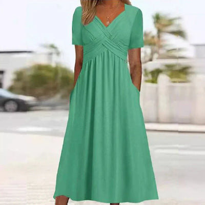 Frances - Elegant og Sofistikeret Kjole med Flatterende Design