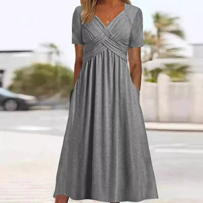 Frances - Elegant og Sofistikeret Kjole med Flatterende Design